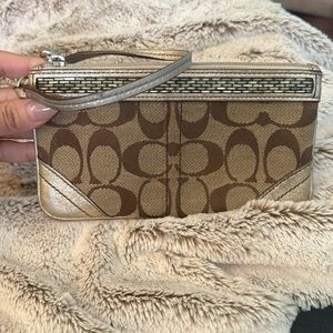 Gold canvas and leather wristlet